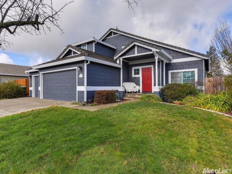 Welcome home! Fresh exterior paint highlights the cottage charm.
