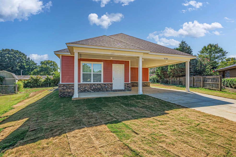 View of front of house with a front lawn