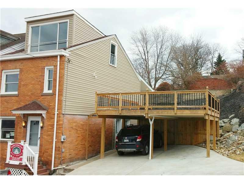 Exterior Front. Four Parking Spaces and a MASSIVE 