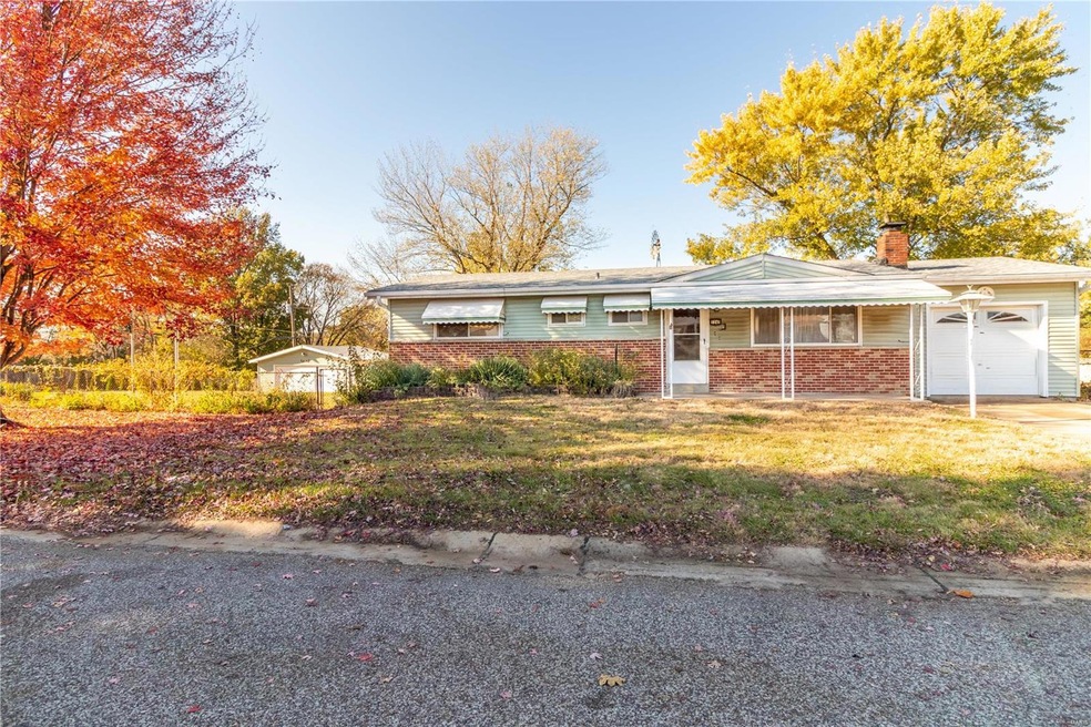 Huge lot with detached garage to the left