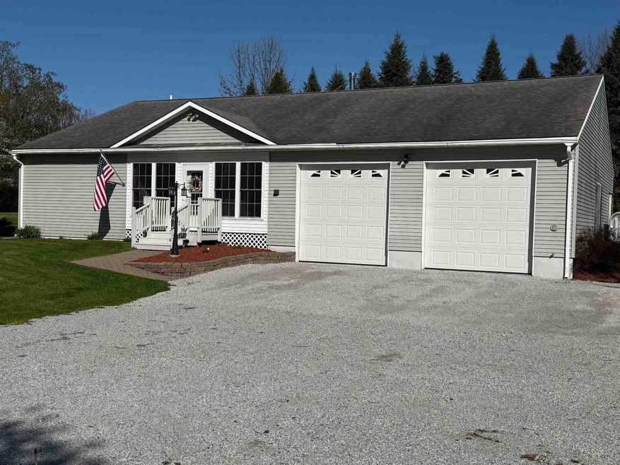 Relax next to Lake Champlain with one floor living...