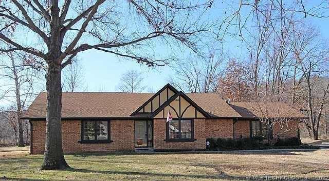 Gorgeous full brick single story home on 2.5 acres