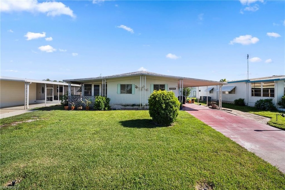 View of front facade featuring a front yard and a 