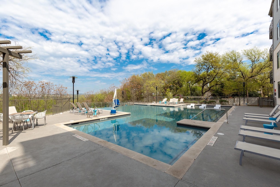 Community pool with a patio area