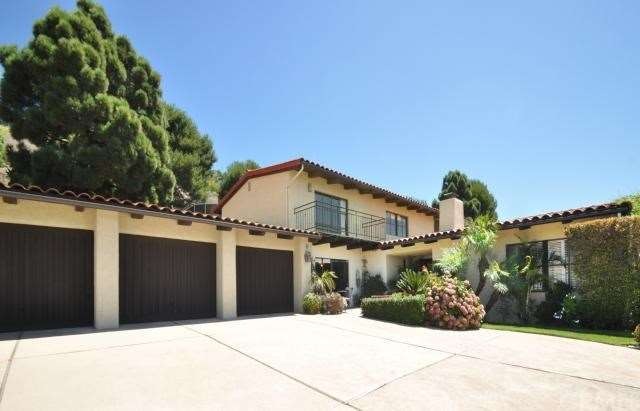 Gorgeous Mediterranean Home with 3 Car Garage