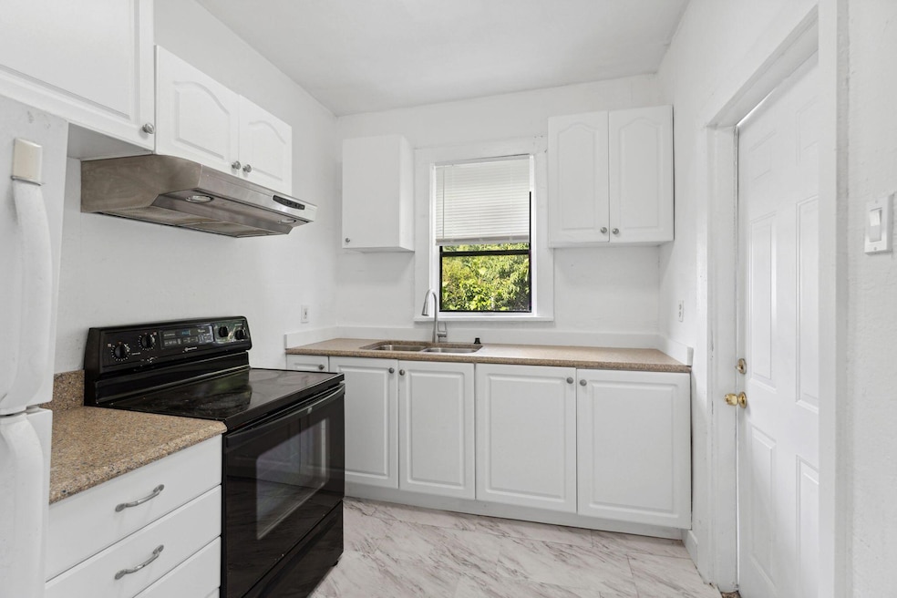 3509 Pinewood Ave unit 1-2, West Palm Beach, FL 33407 - photo 1