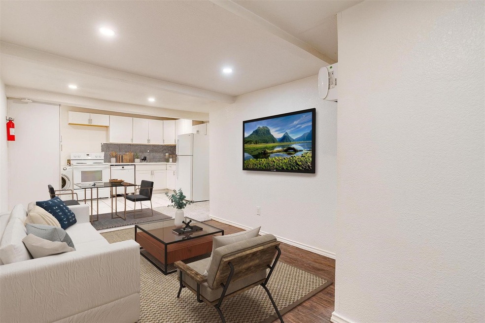Living room featuring hardwood / wood-style floori