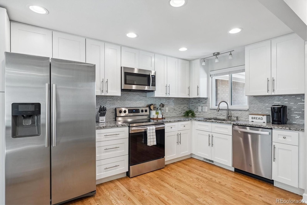 7390 W 74th Place, Arvada, CO 80003 - photo 1