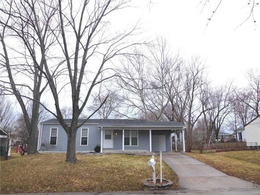 Vinyl siding, covered porch & built in storage on 