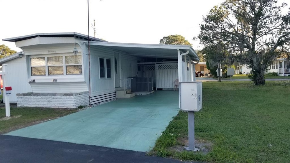 Large carport, New AC, front windows of the living