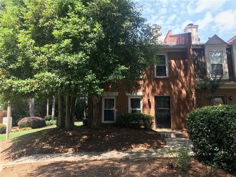 Totally updated end unit townhouse in beautiful Wo
