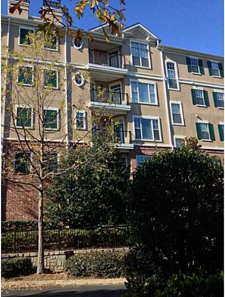 Exterior Front. Brick and Stucco Multi level Condo