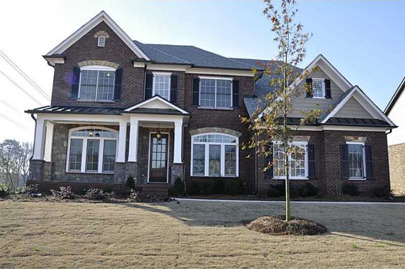Exterior Front. 3 sides brick