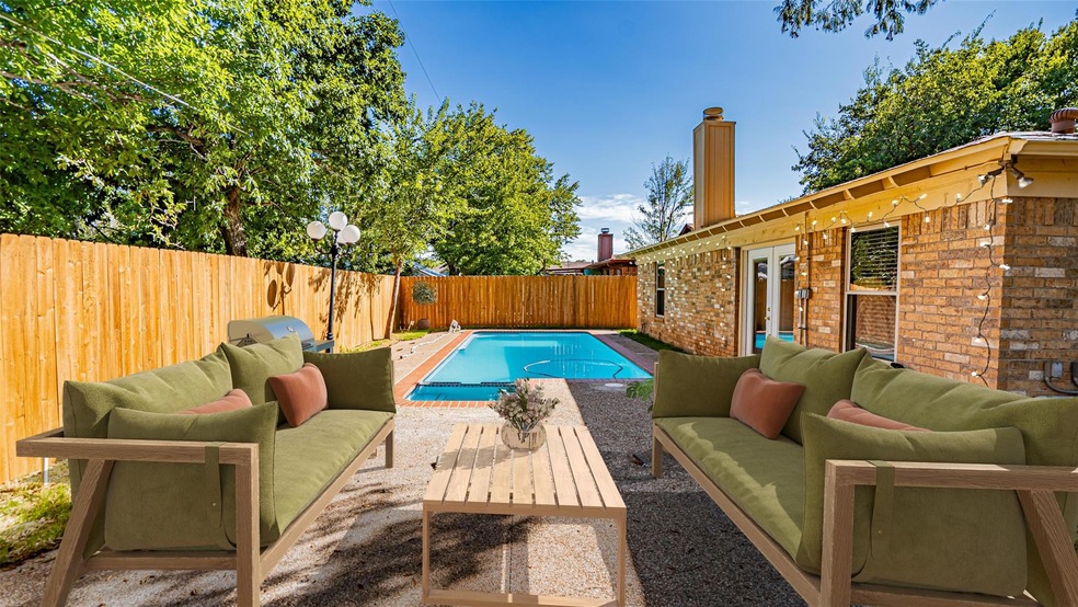 View of pool with an outdoor living space and a pa