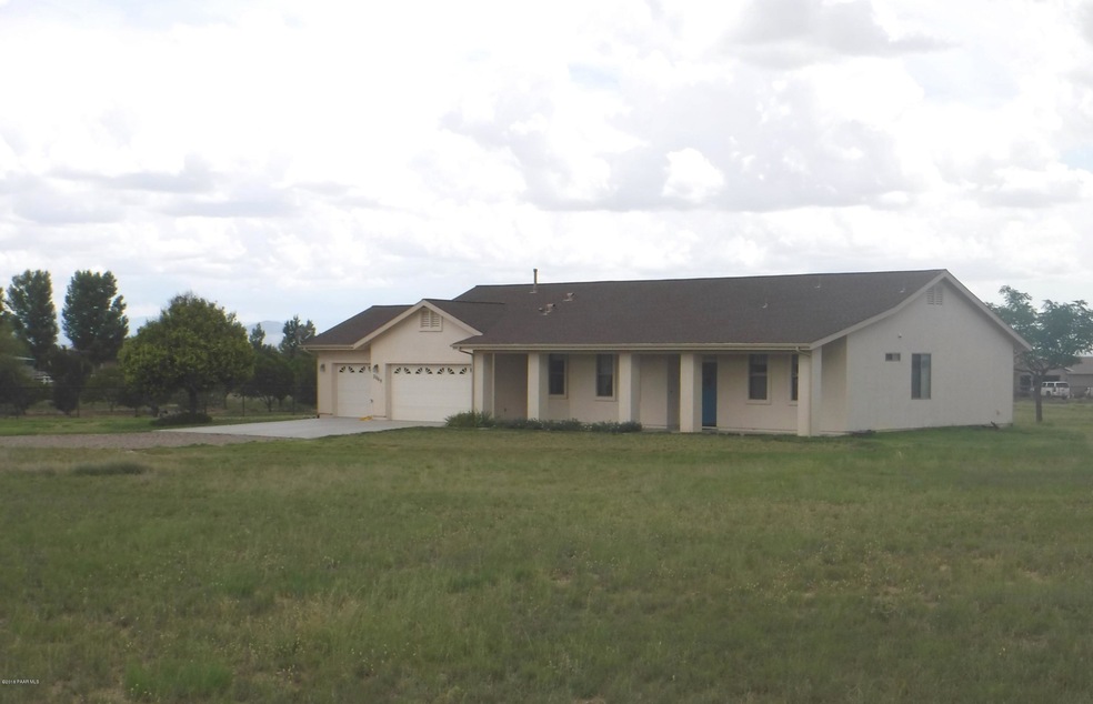 front of home with trees