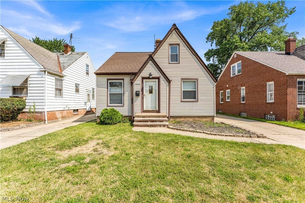 View of front of home featuring a front lawn