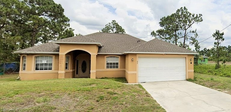 655 Muldoon Ave S, Lehigh Acres, FL 33974 - photo 1