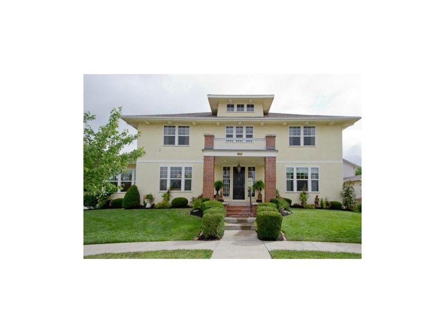 This two story Craftsman styled home sits on a cor