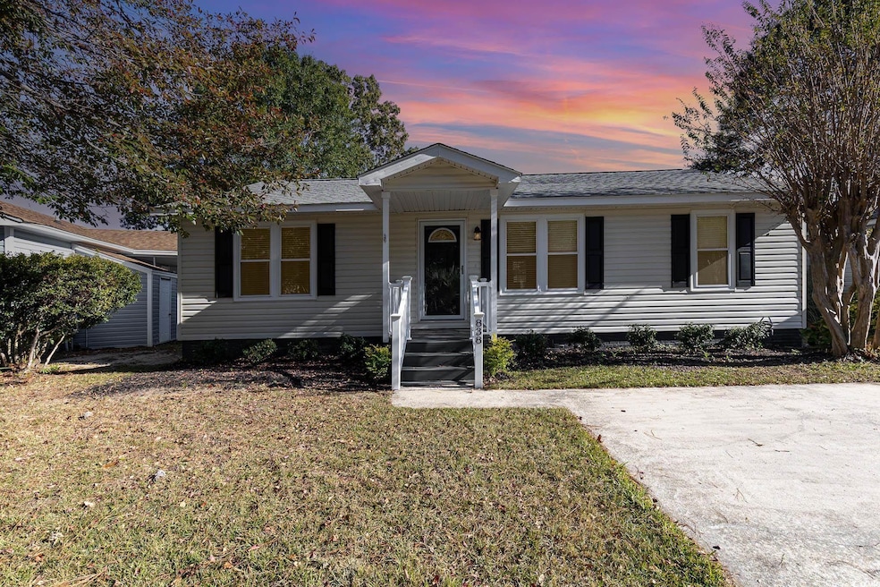 View of front of house with a lawn