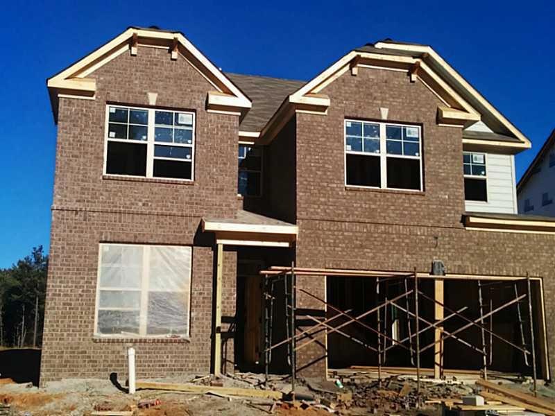 Exterior Front. All brick elevation with a portico