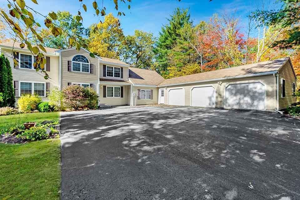 Privately sited amidst 2.42 peaceful acres, yet mi