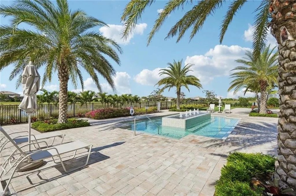 Pool featuring fence and a patio area