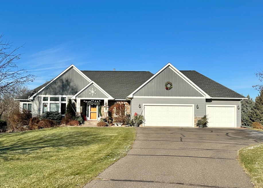 The Home you've been waiting for is here!!! Huge list of upgrades in the suppliments for this home. Waters Edge is a sought after location in New Richmond and you'll love the location and private backyard this home has to offer!