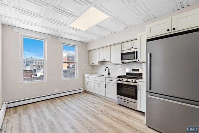 221 3rd St unit 2, Fairview, NJ 07022 - photo 1