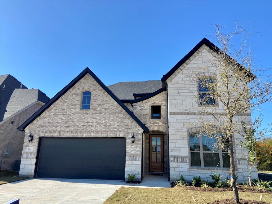 Gorgeous new stone & brick home backing to serene Nature Area