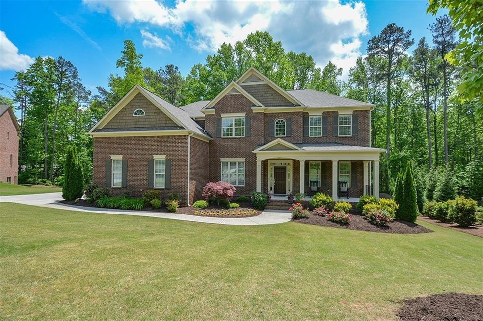 Stunning 3-sides brick home in sought after Davis 