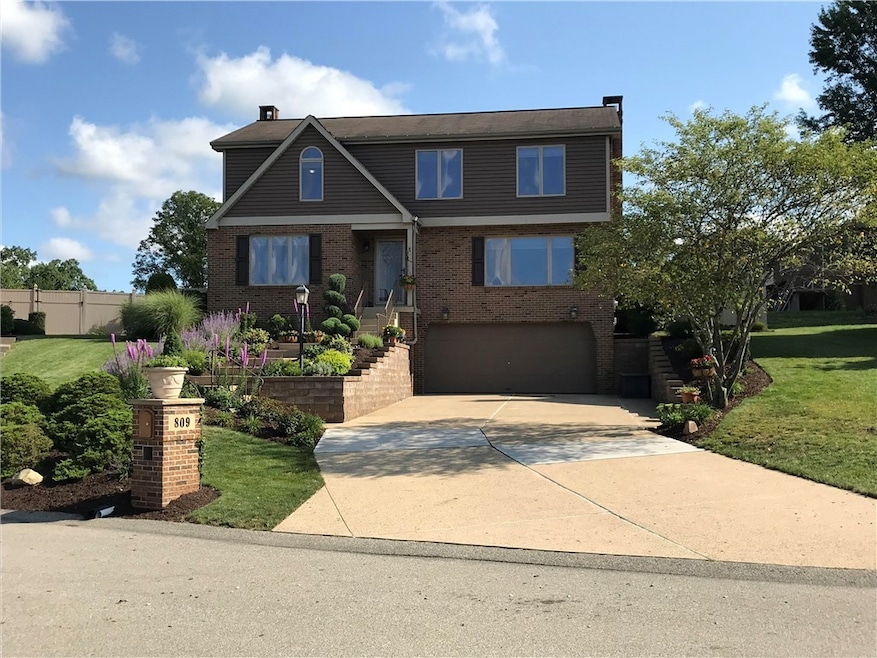 Welcome to this custom built primarily brick home