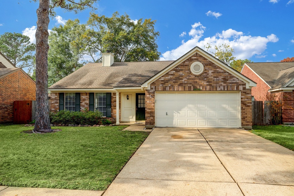 7827 Hidden Oaks Ln, Houston, TX 77095 - photo 1