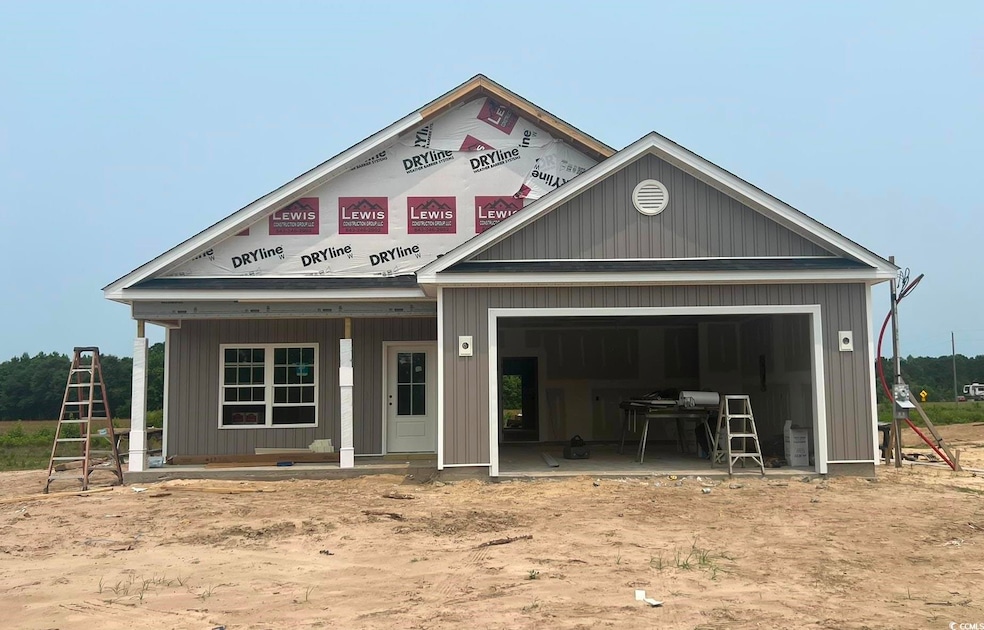 Property in mid-construction with an attached garage