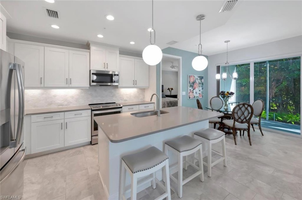 2542 Seychelles Dr unit 704, Naples, FL 34112 - photo 1