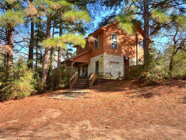 Beautiful home nestled in Pine trees with open pas