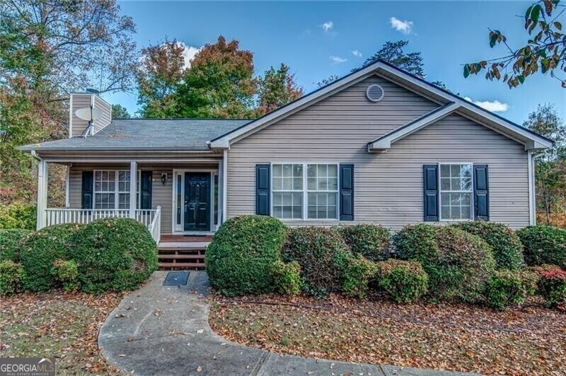View of front of property with covered porch