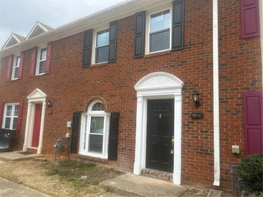 View of front facade featuring brick siding