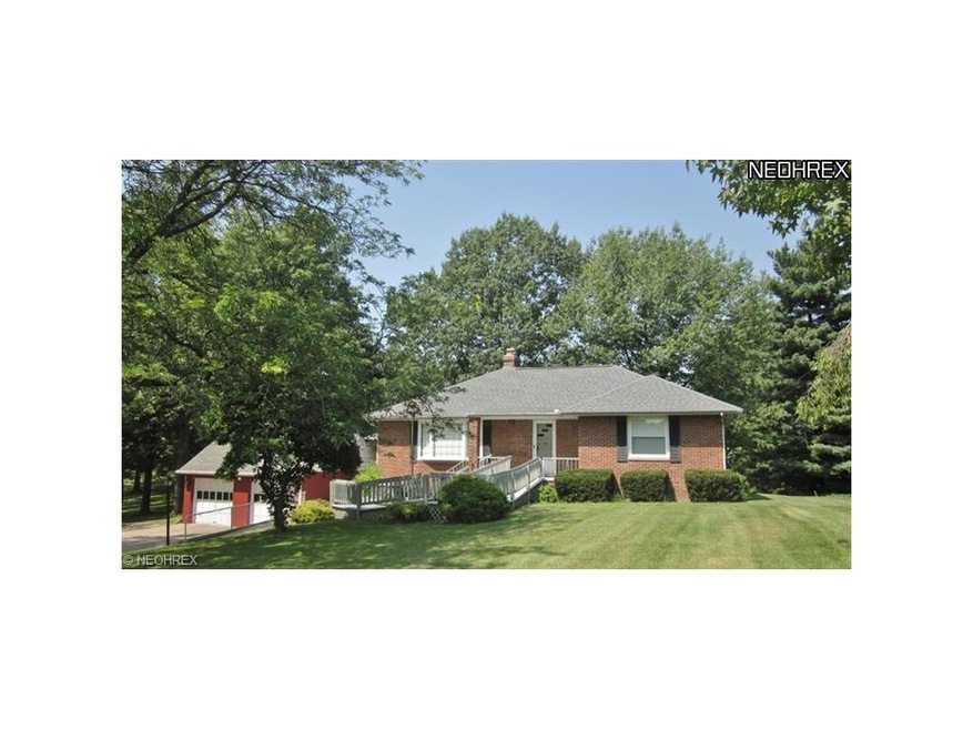 Front yard of the solidly built brick home with a 