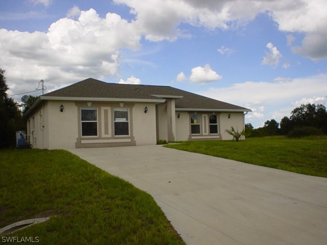 2605 E 17th St, Lehigh Acres, FL 33972 - photo 1