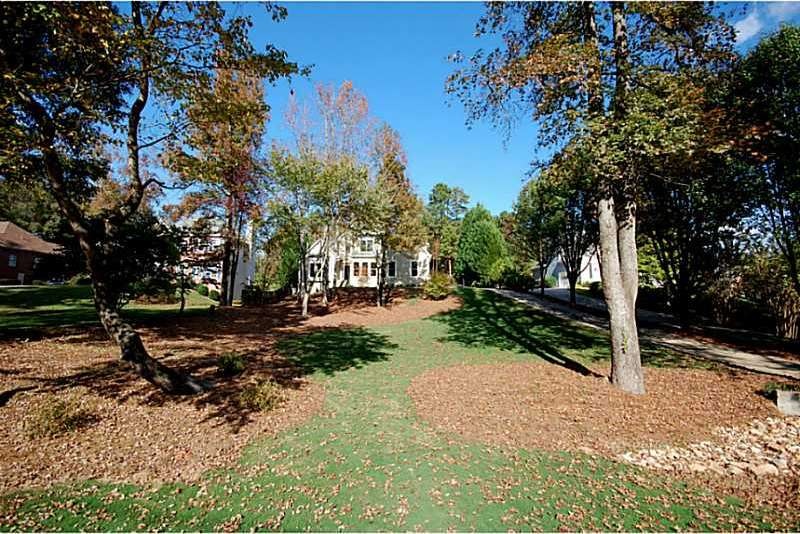Exterior Front. SWEEPING FRONT YARD!