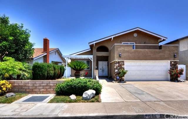 Welcome home! Well-manicured front yard with extra