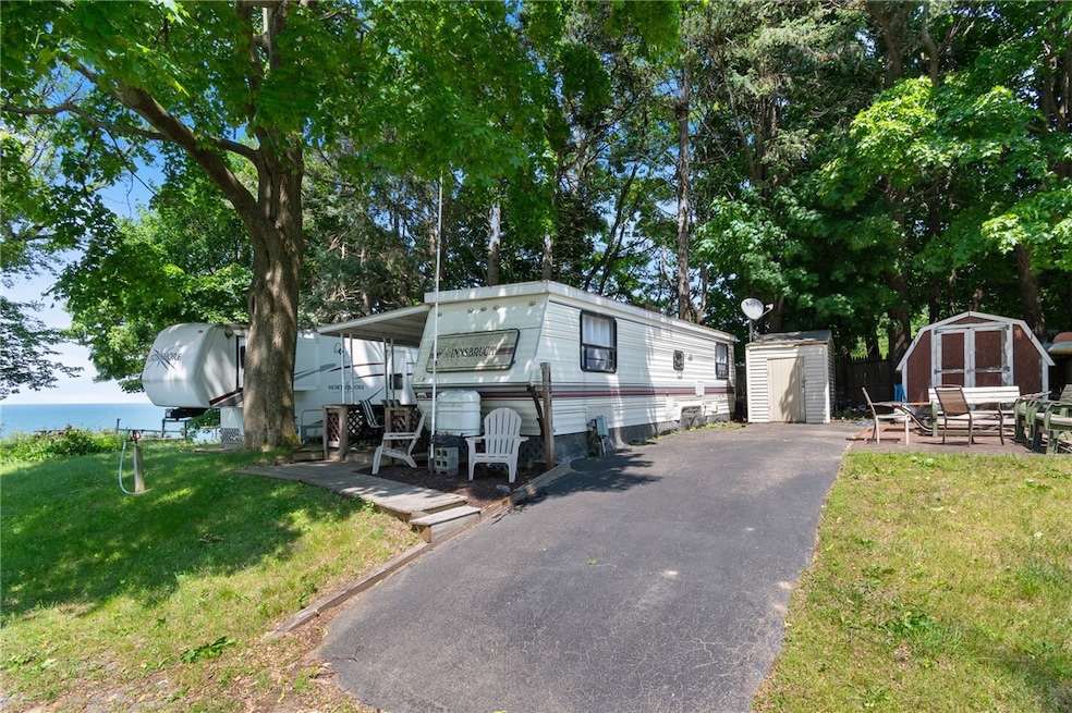 7945 Lake Rd unit 129, Sodus Point, NY 14555 - photo 1