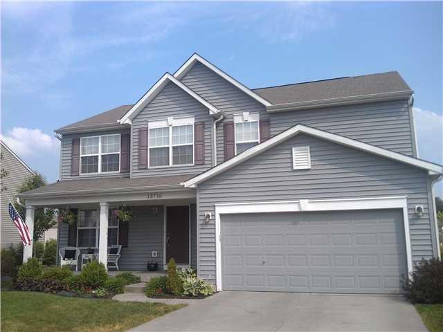 Exterior Front. Gorgeous landscaping surrounds this beautiful home!