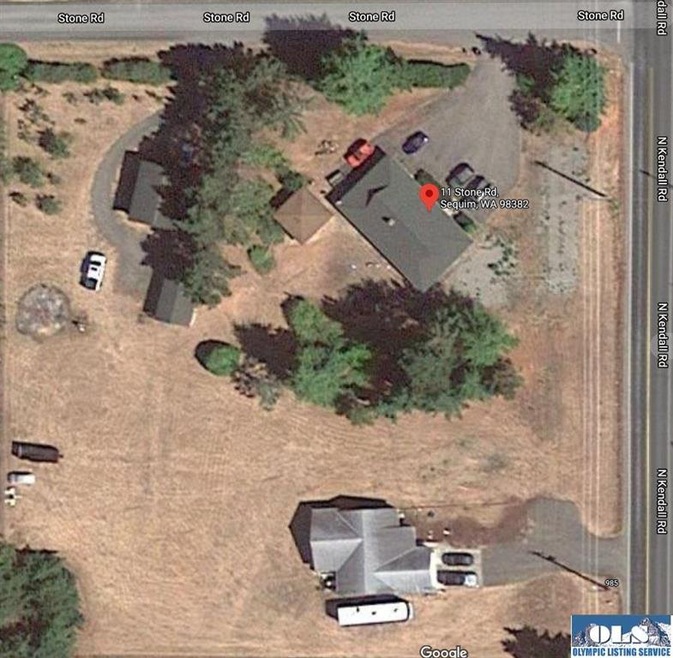 2.1 acre corner lot with two homes.  Both homes sh