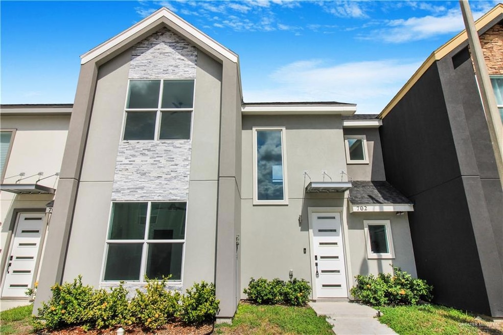View of front of property featuring stucco siding