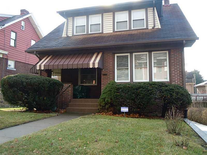 Exterior Front. Large porch in the level entry hom