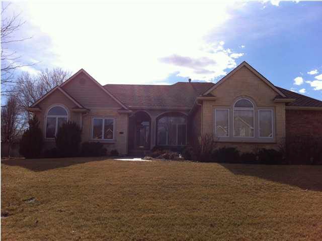 Great stone & brick curb appeal! Corner lot with s
