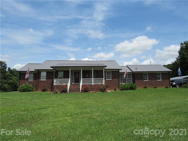 Nice Brick Home with 44 +- Acres.  Metal roof that
