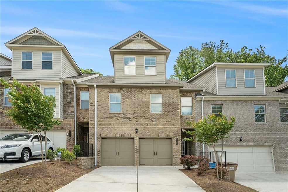 View of front of property featuring a garage