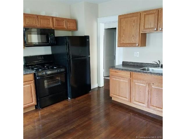 Completely remodeled kitchens in all 3 units.